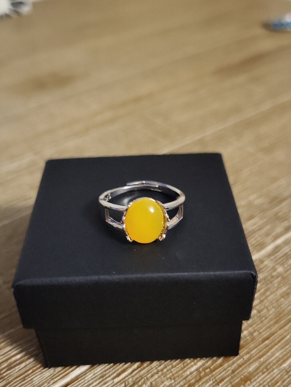 925 Silver With An Amber Color Oval Stone Adjustable Ring